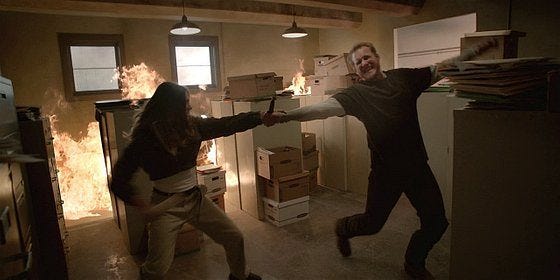 Walker Micki pulling bad guy from fire. Walker Micki pulling bad guy from fire.