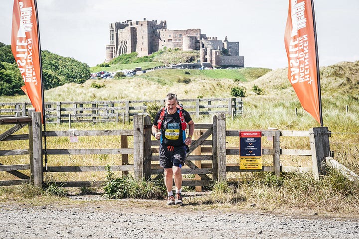 Tony Collier running and his marathon major medals
