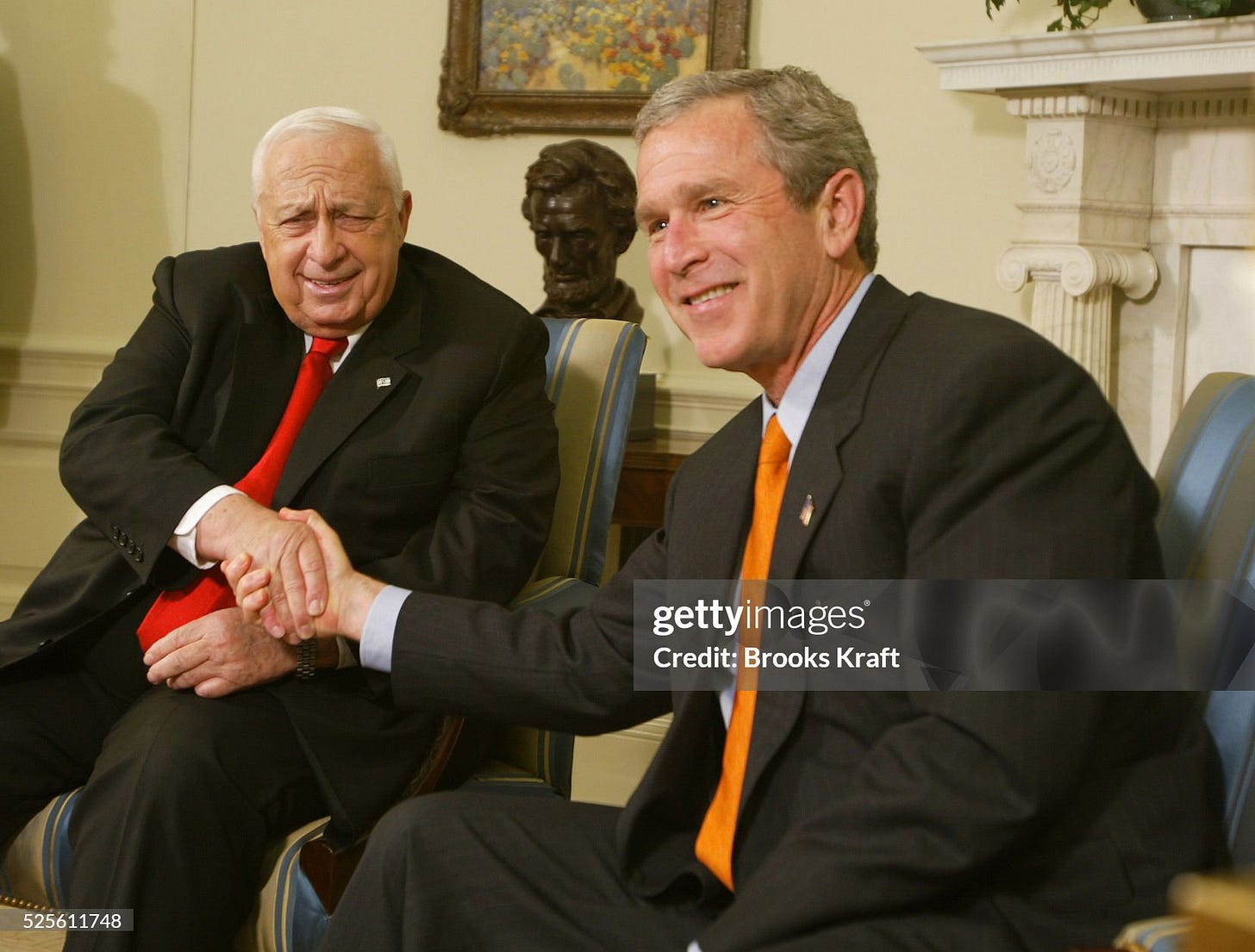 George W. Bush and Ariel Sharon Shaking Hands