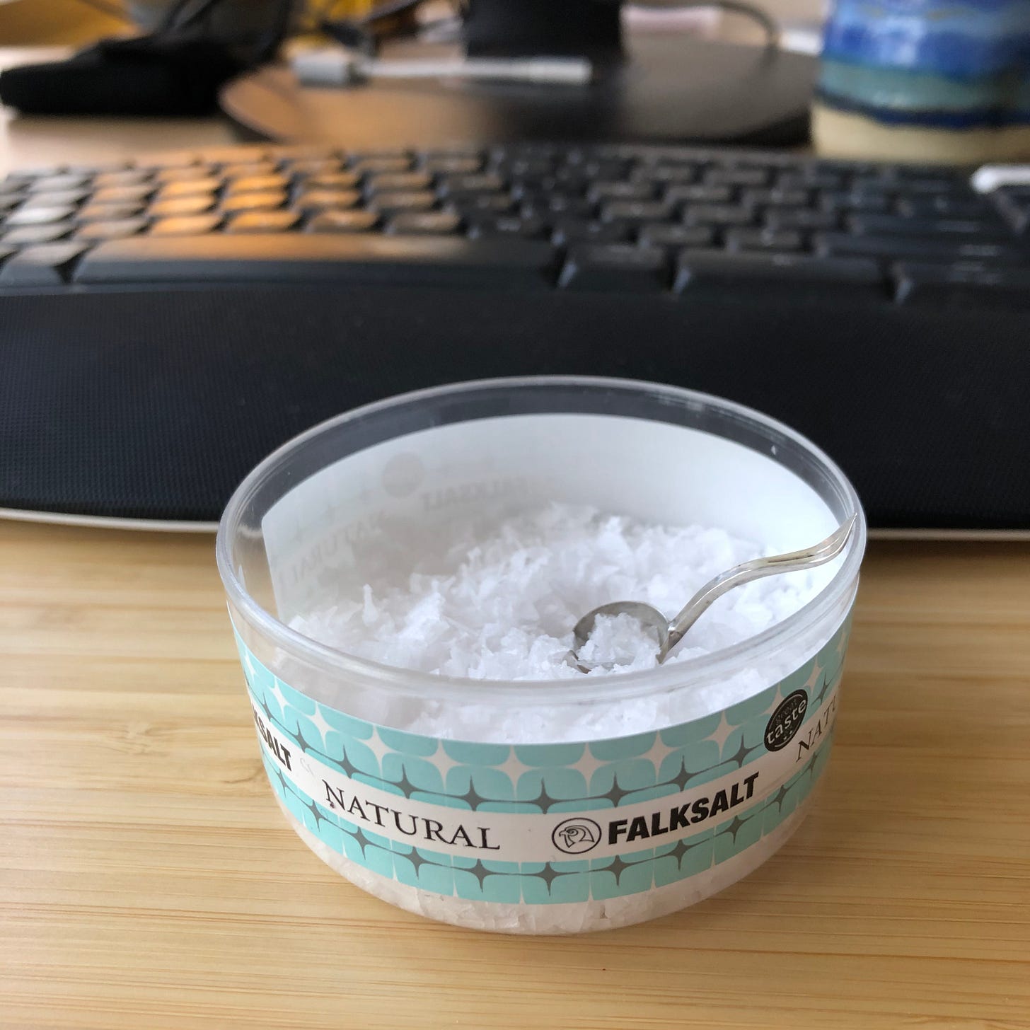Flaky salt from IKEA with a tiny silver ladle. Like, the tiniest. 