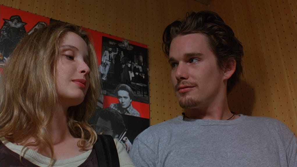 Still from BEFORE SUNRISE with Julie Delpy and Ethan Hawke in the listening room at a record store