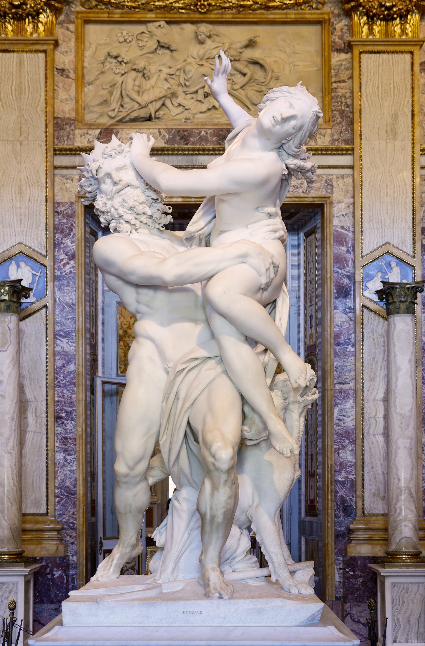 Bernini's marble of Pluto seizing Proserpina, his fingers pressing into her thigh Bernini's marble of Pluto seizing Proserpina, his fingers pressing into her thigh