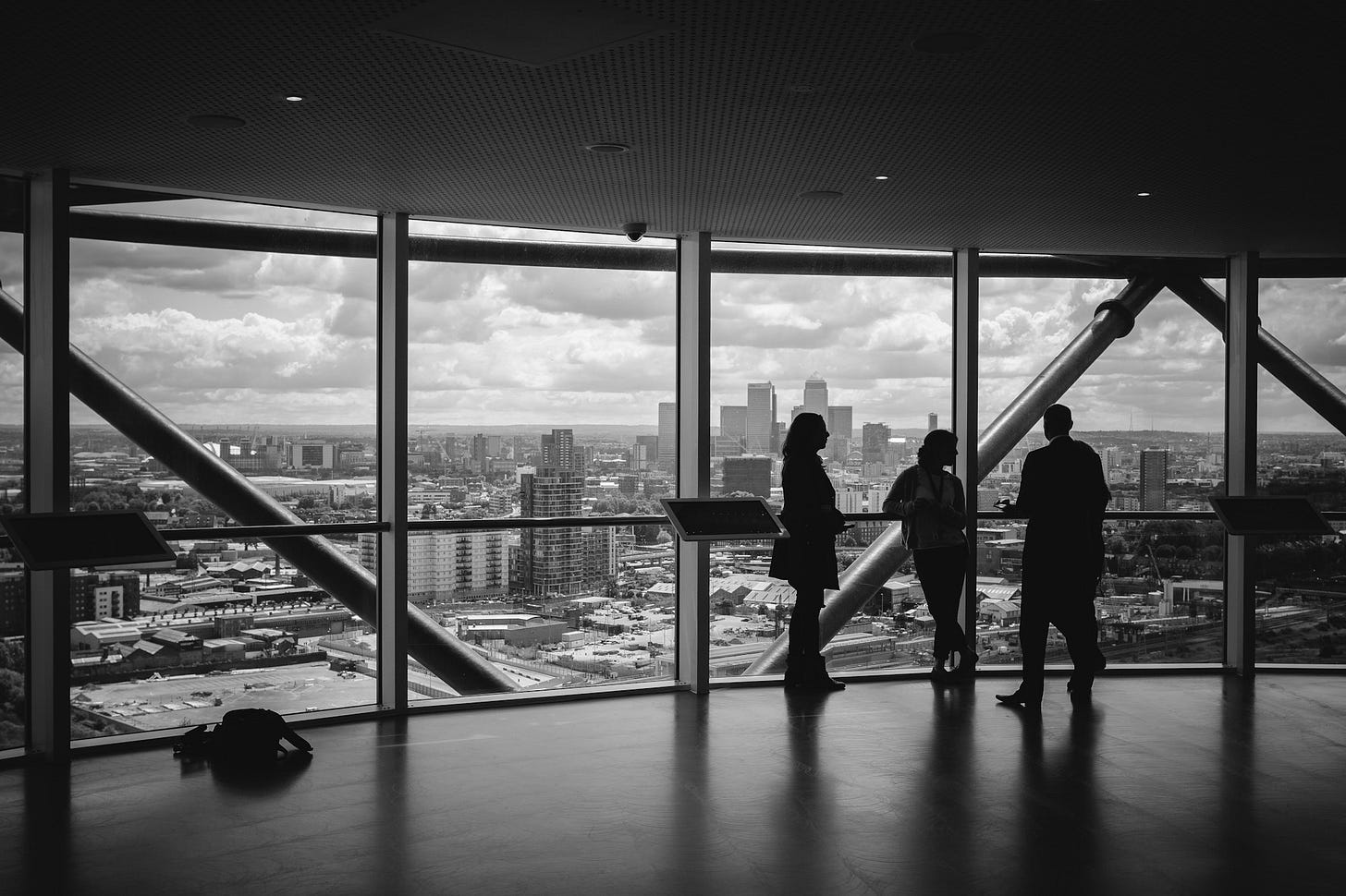 meeting near a transparent glass meeting near a transparent glass