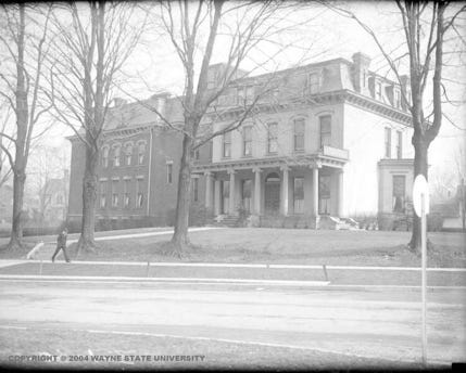 A person walking in front of a building

AI-generated content may be incorrect.