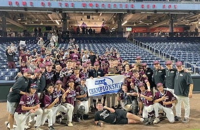 Chelmsford baseball celebrates winning the Division I state title.