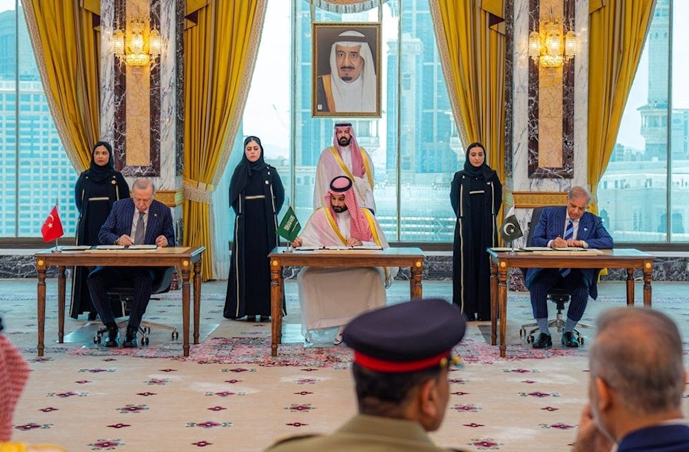 Turkish President Recep Tayyip Erdogan, Saudi Crown Prince Mohammed bin Salman and Pakistani Prime Minister Shehbaz Sharif sign a trilateral defense agreement in Mecca, Saudi Arabia, Friday, Aug. 7, 2026. (Saudi Press Agency via AP) Turkish President Recep Tayyip Erdogan, Saudi Crown Prince Mohammed bin Salman and Pakistani Prime Minister Shehbaz Sharif sign a trilateral defense agreement in Mecca, Saudi Arabia, Friday, Aug. 7, 2026. (Saudi Press Agency via AP)