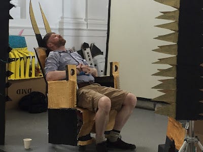 Nine photos of film production crew collecting, painting, building sets with, and filming cardboard.