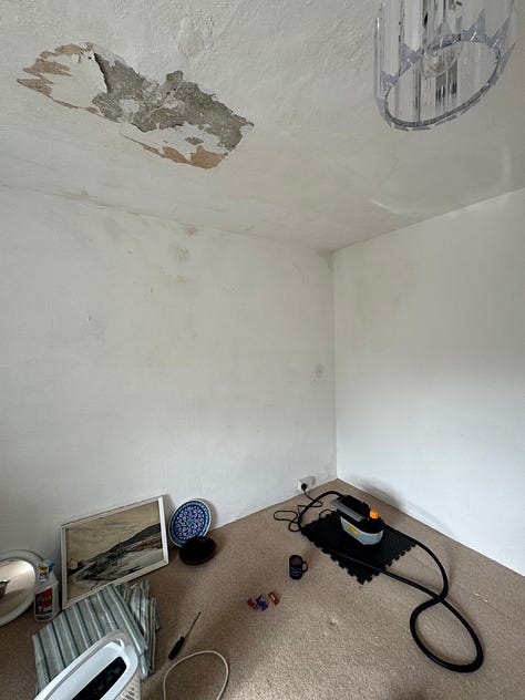 A bedroom in 5 photos - progress pictures of taking off rotten woodchip wallpaper, scraping the walls and ripping up the carpet. 