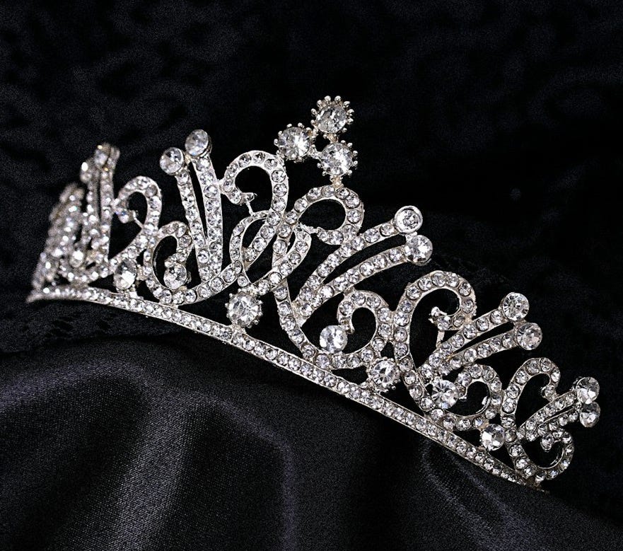a tiara on a black background