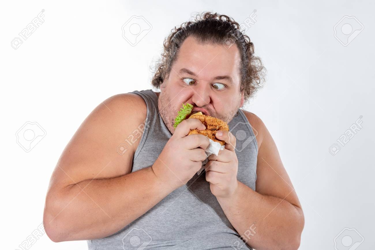 Portrait Of Funny Fat Man Eating Fast Food Burger Isolated Stock Photo,  Picture and Royalty Free Image. Image 116541518.