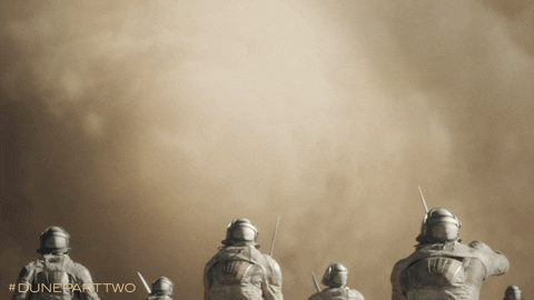 A giant worm's mouth appears out of a dust cloud. A giant worm's mouth appears out of a dust cloud.