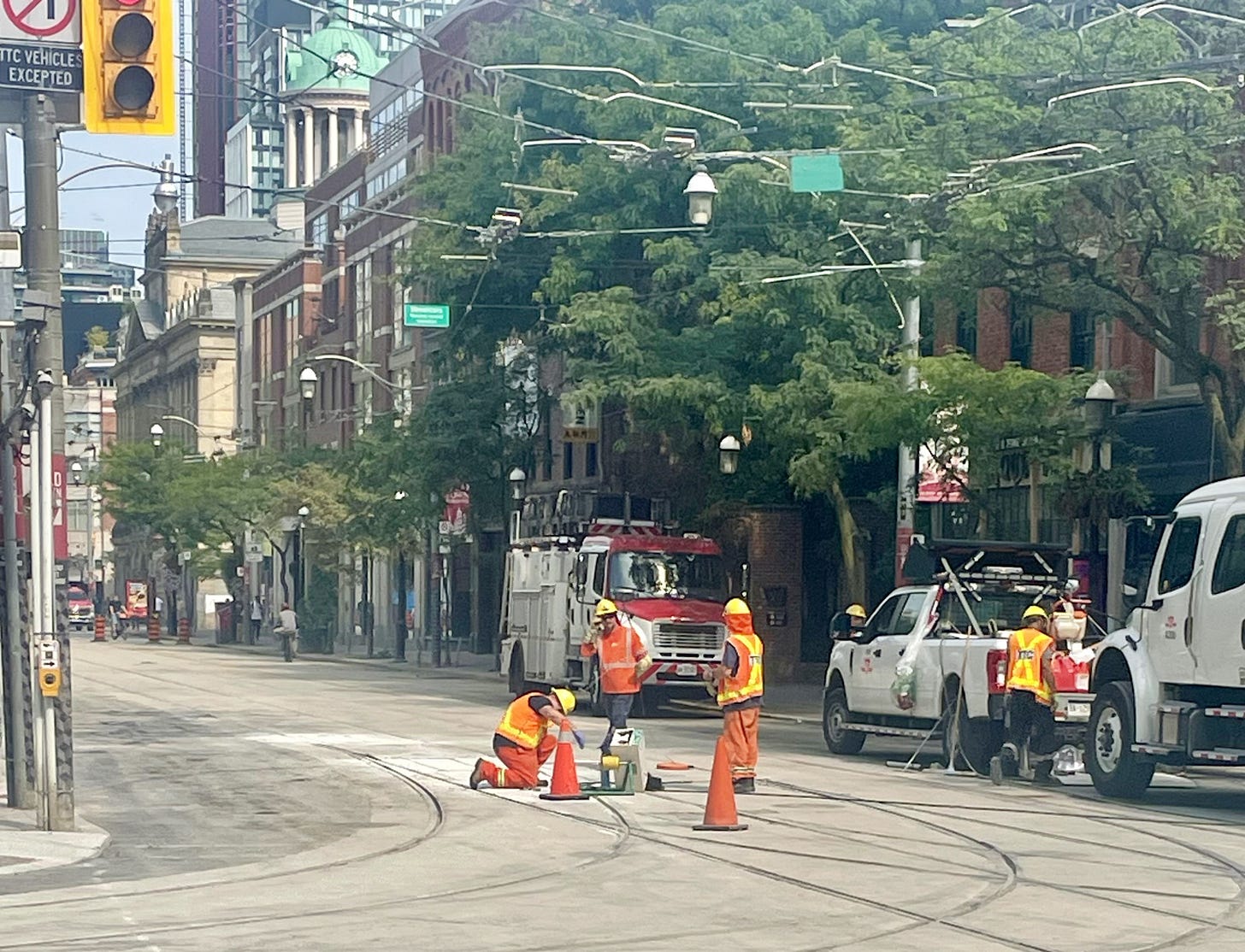 Toronto street repairs at King and Church, construction crews working on streetcar tracks and watermains — example used in Beating the Tide Weekly 43 Thought of the Week on principal vs agent incentives.