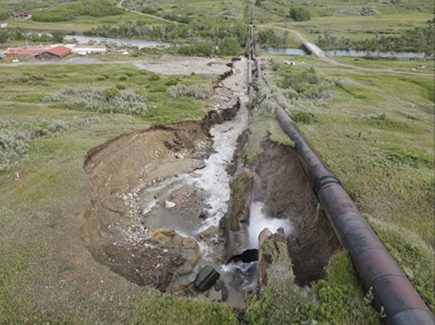 St. Mary canal siphons burst resulting in severe erosion and flooding in the surrounding area. (Photo via U.S. Bureau of Reclamation) St. Mary canal siphons burst resulting in severe erosion and flooding in the surrounding area. (Photo via U.S. Bureau of Reclamation)