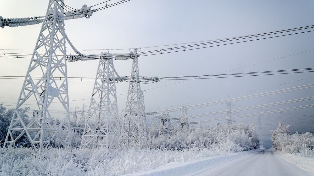 High voltage power lines in the winter. High voltage power lines in the winter.
