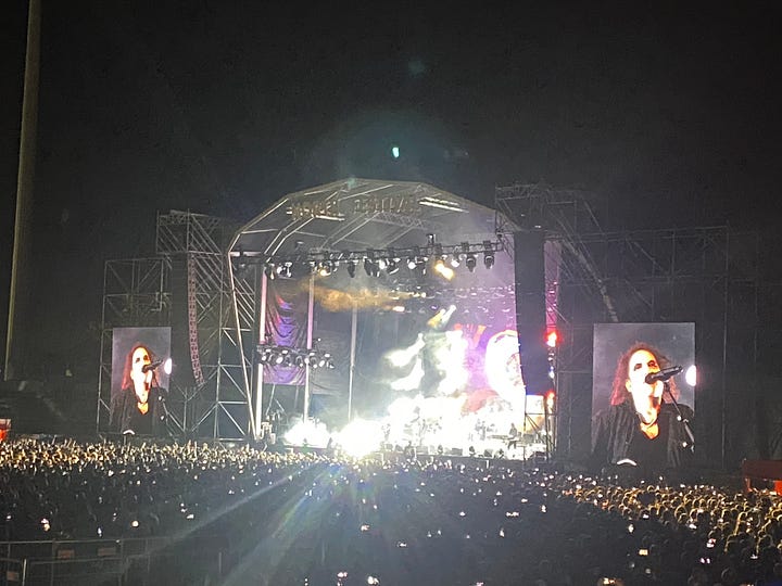 Image of a bingo game and photo taken at Cure concert