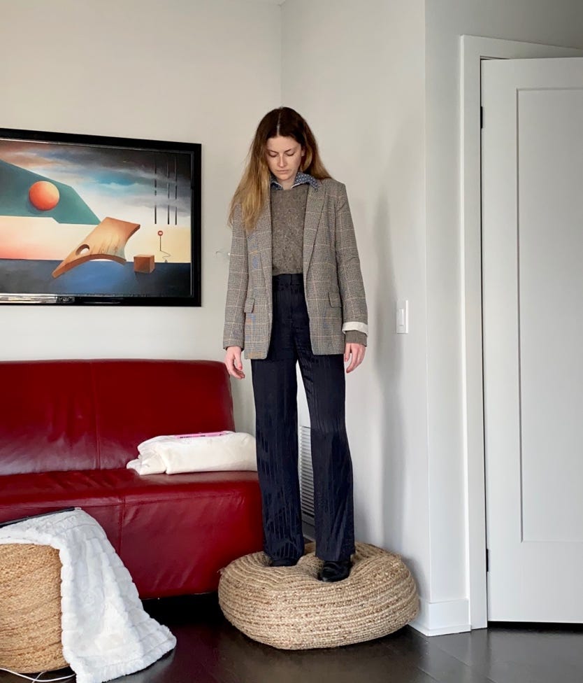 A person standing in a room

Description automatically generated with medium confidence