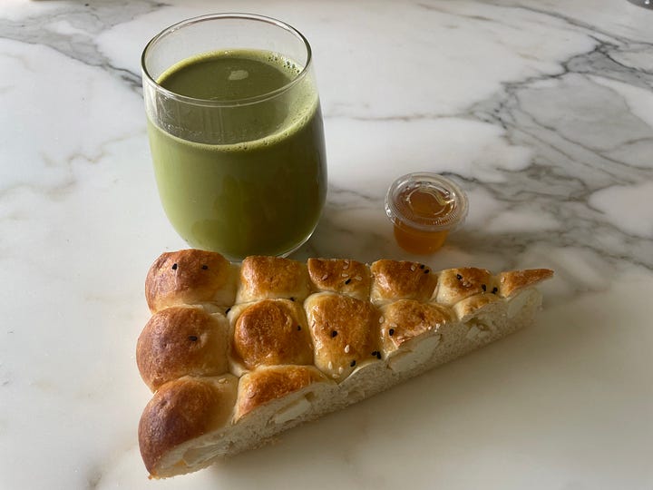 a collection of drinks and honeycomb bread from Haraz Coffee House