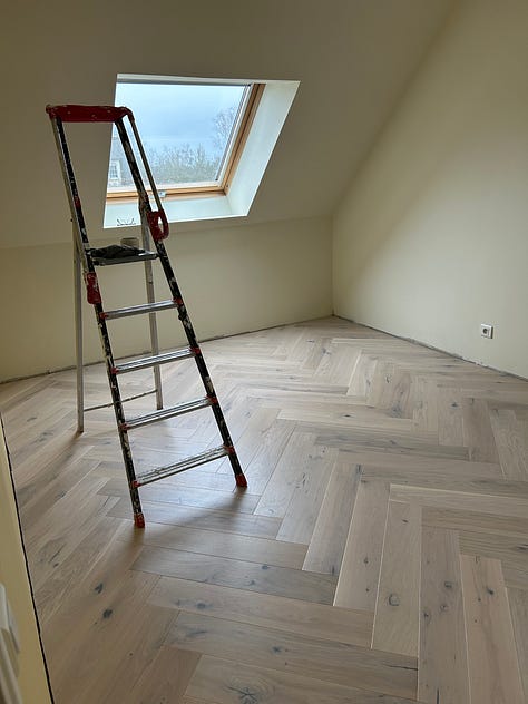 rooms with carpet and wood floors in a house under renovation in France