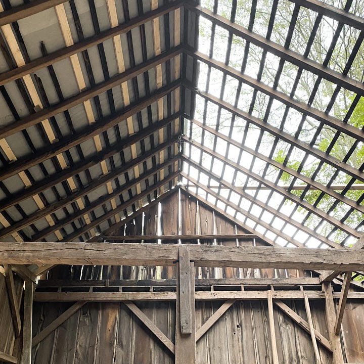 Putting on a new roof and adding the siding to the new barn.