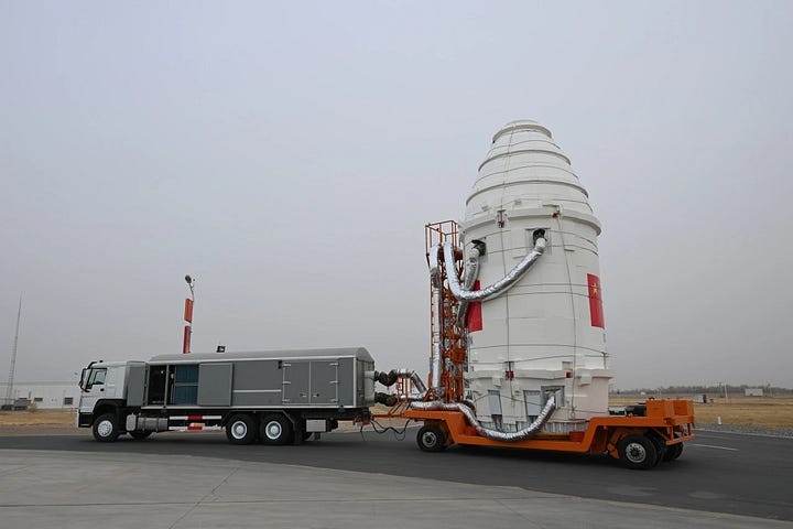 The second-stage and fairing for the Long March 2D Y78 vehicle heading to the launch pad.