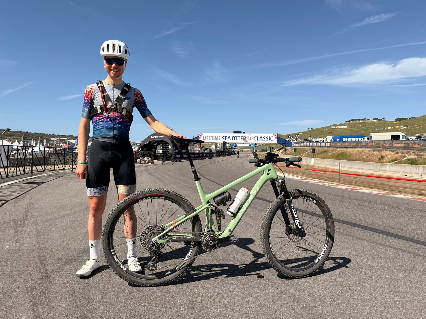 person posing with a bike 