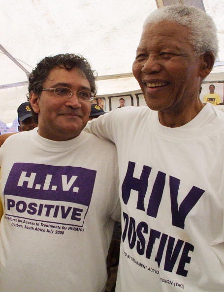 Former South African president Nelson Mandela (L)