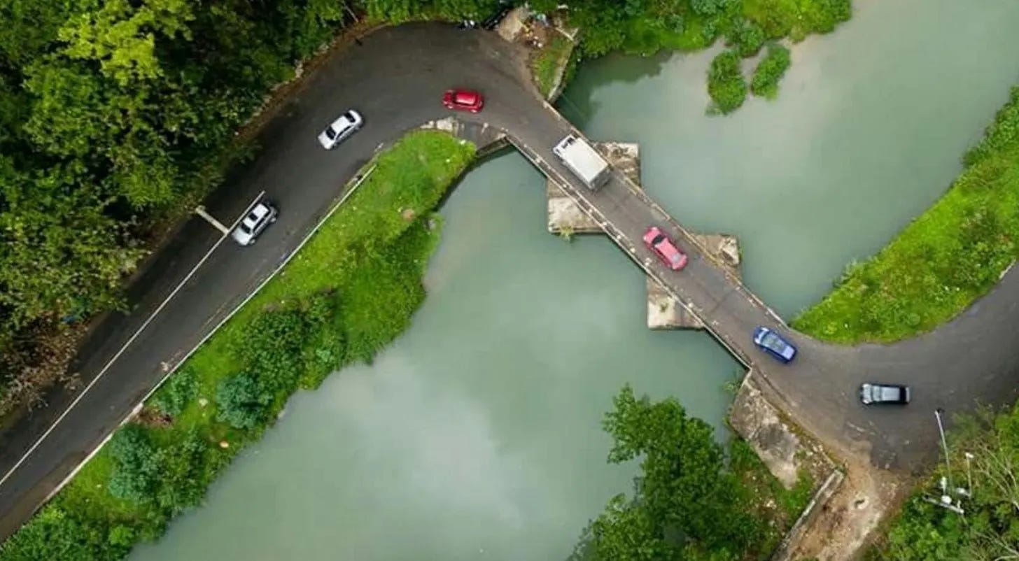 Flat Bridge in St. Catherine has long stood as one of Jamaica’s most iconic and flood-prone crossings, symbolising both the beauty and vulnerability of the island’s ageing infrastructure network. Flat Bridge in St. Catherine has long stood as one of Jamaica’s most iconic and flood-prone crossings, symbolising both the beauty and vulnerability of the island’s ageing infrastructure network.
