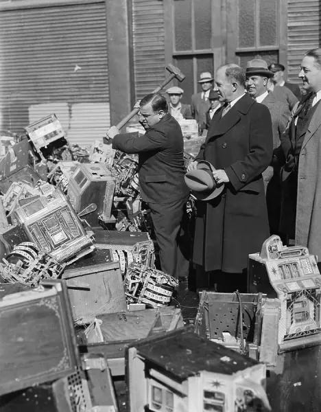  : La Guardia Smashes Slot Machines