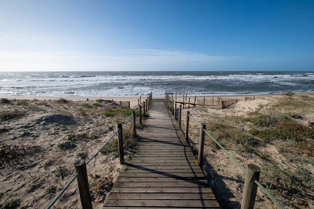 A boardwalk to the ocean beach A boardwalk to the ocean beach