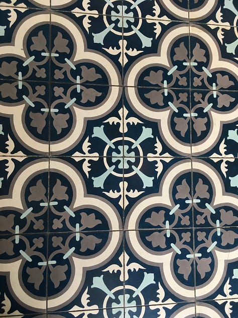Rooftop pool, interior courtyard from top floor, detail of lobby tile.