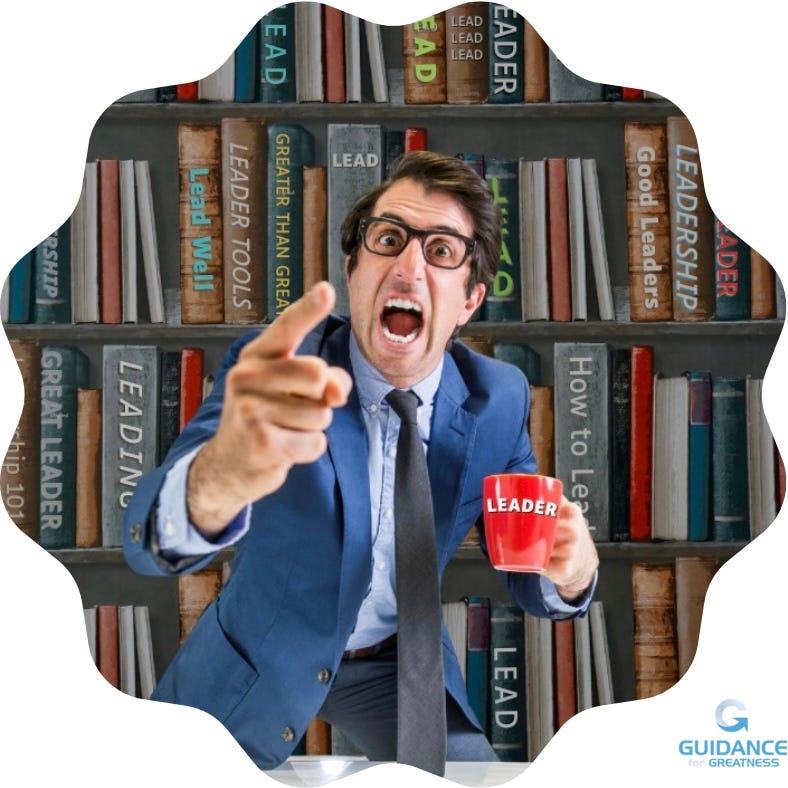 A man In a blue business suit and glasses points with his right finger and screams directly at the viewer. In his left hand is a round mug that says “leader.” Behind him is a large bookshelf with many books with titles like, Greater than Great, Leadership 101, Leading, etc.