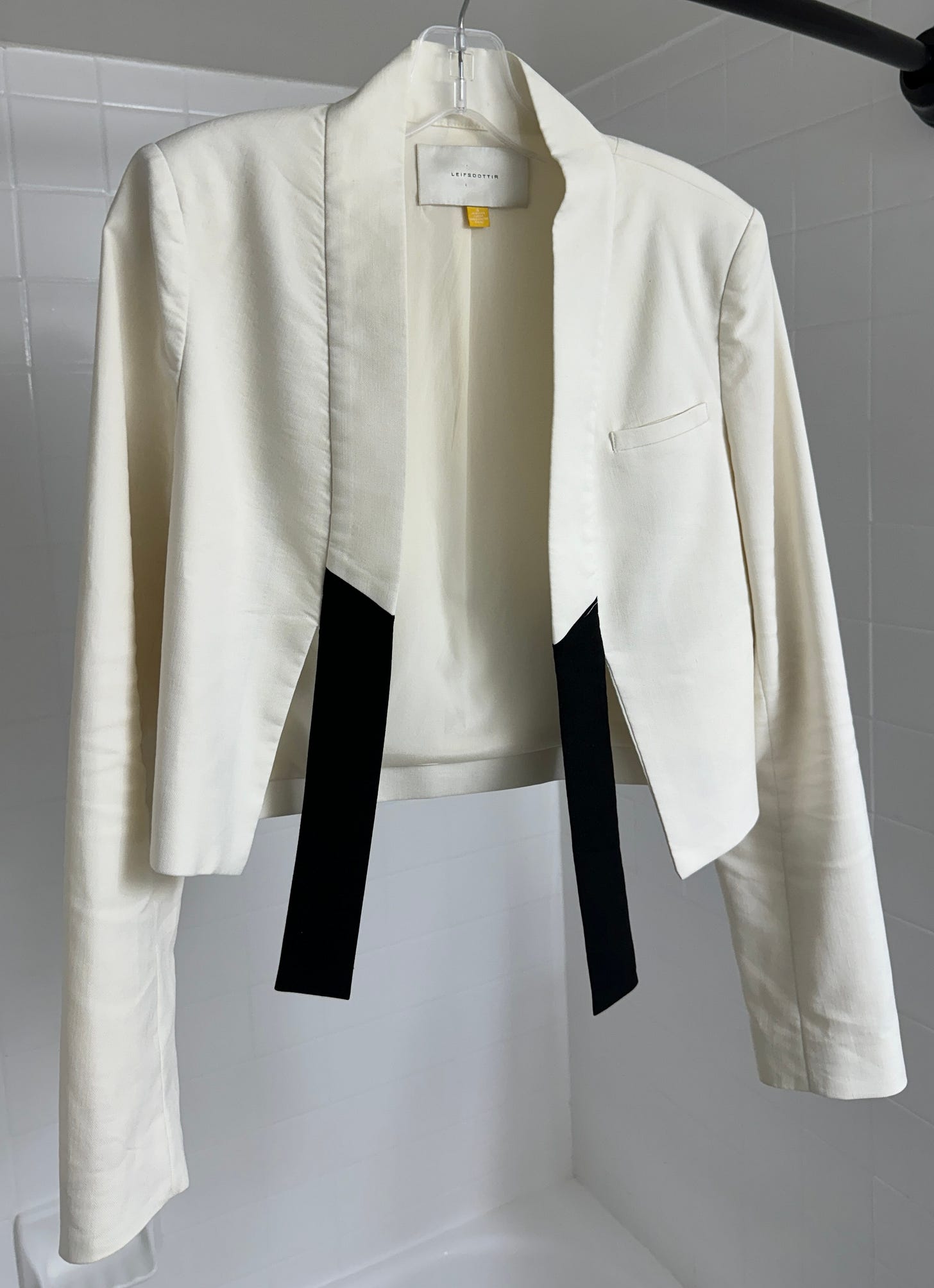 white and black tuxedo inspired blazer