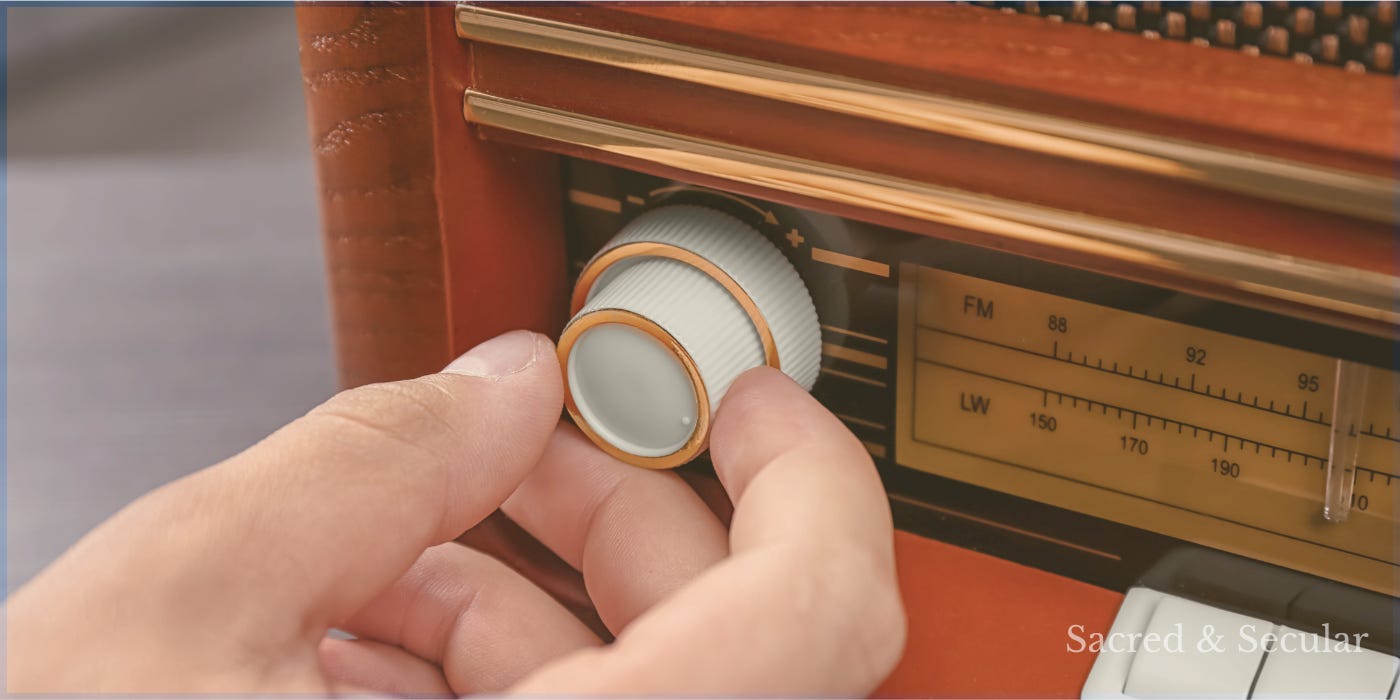 A hand adjusting the tuning dial on an old-fashioned radio, evoking the search for clarity among competing signals and noise. A hand adjusting the tuning dial on an old-fashioned radio, evoking the search for clarity among competing signals and noise.