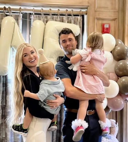 May be an image of 2 people and baby