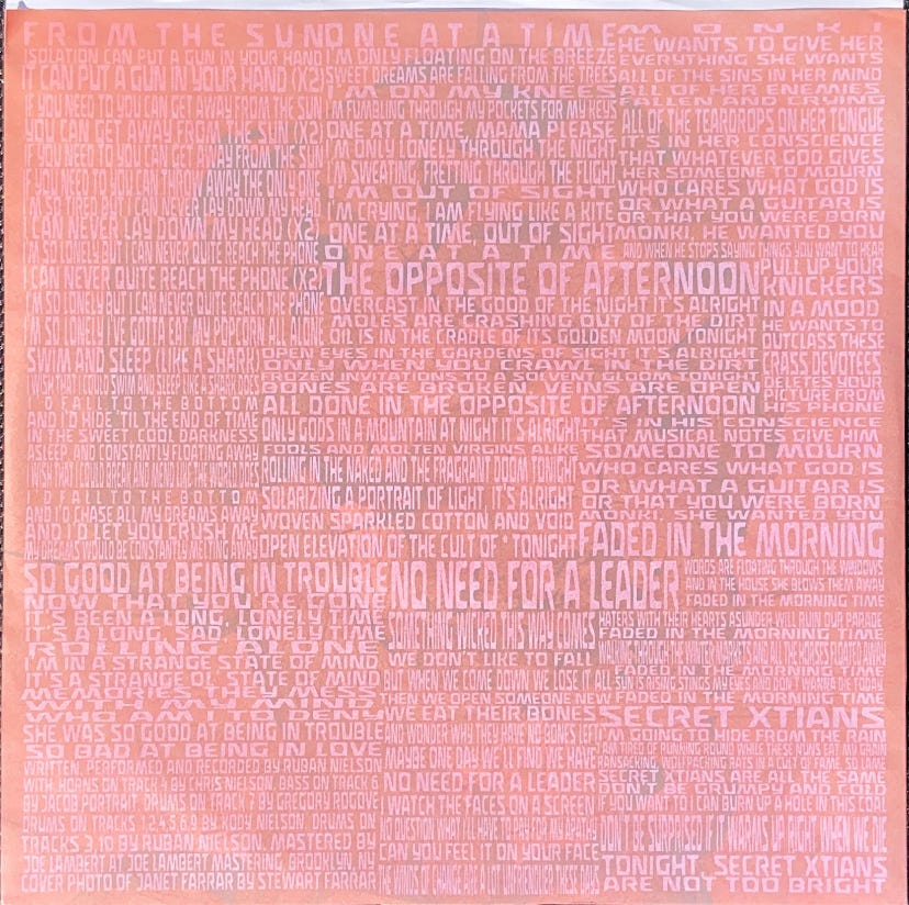 a scan of the record sleeve for Unknown Mortal Orchestra's II, which is densely packed with the liner notes/lyrics for the album