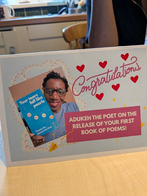 Photos of 2 greetings cards and bunches of flowers given to congratulate on the Adukeh the Poet's book launch