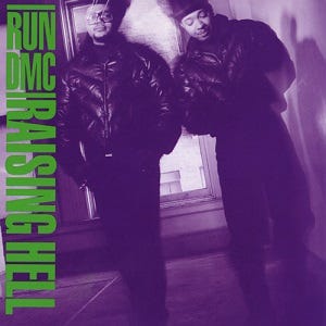 Cover to Raising Hell showing Run and DMC bathed in purple light Cover to Raising Hell showing Run and DMC bathed in purple light