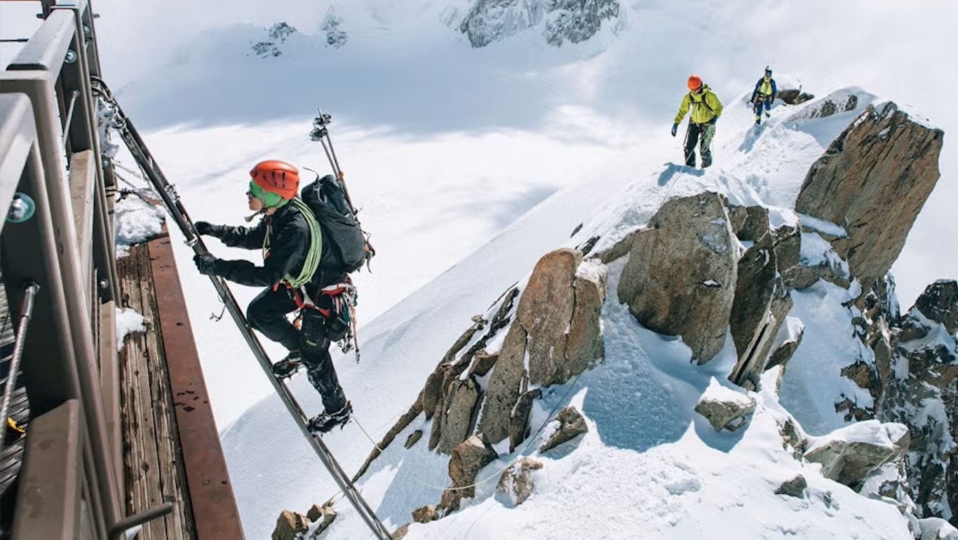 Mountaineers ascending the slopes of Mont Blanc, navigating snow-covered terrain high in the French Alps. Mountaineers ascending the slopes of Mont Blanc, navigating snow-covered terrain high in the French Alps.