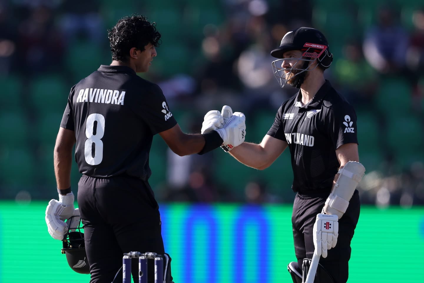 Rachin Ravindra is congratulated by Kane Williamson after reaching his century. Photo / Getty Images