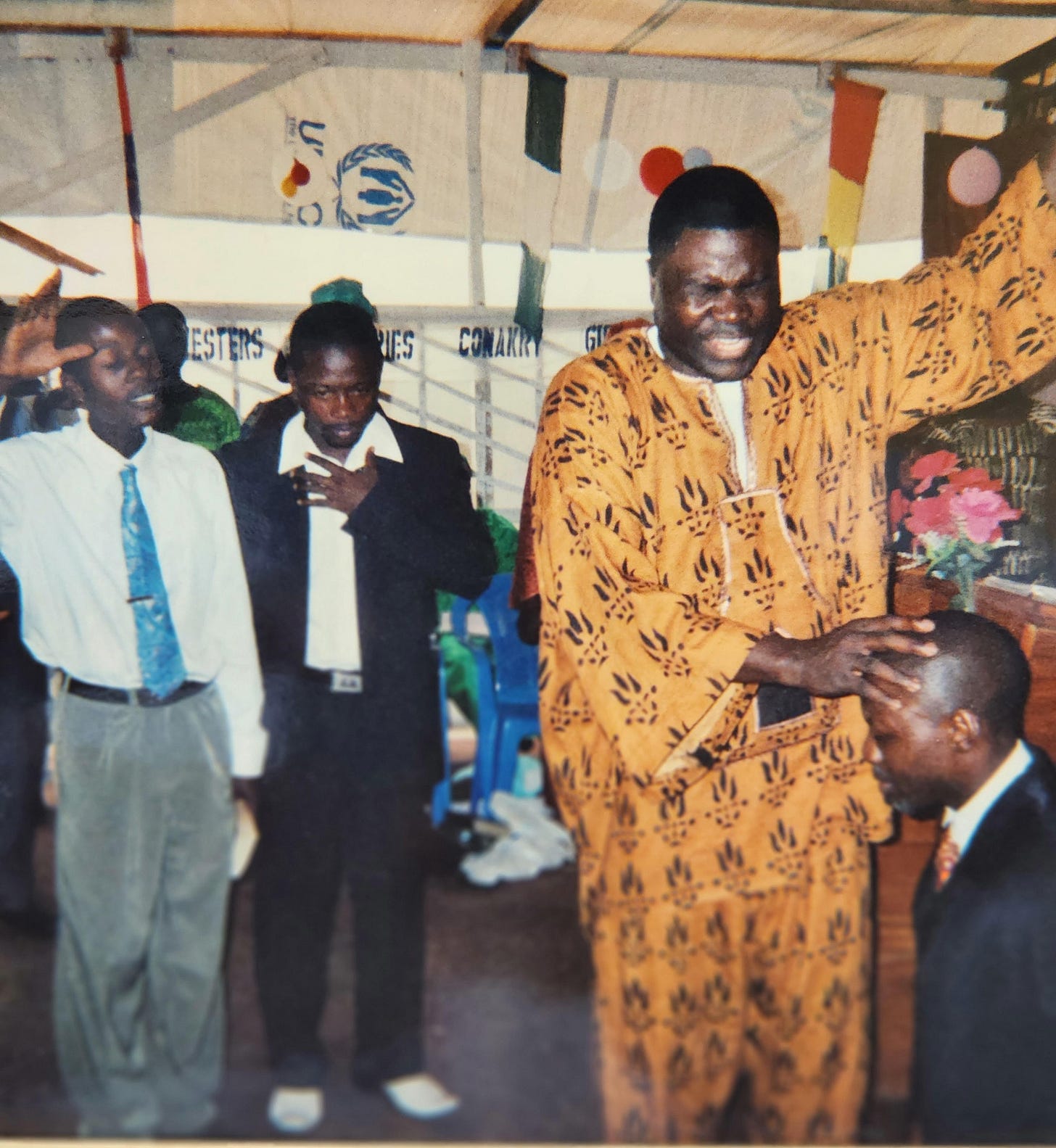 Finnian and believers worshipping 
