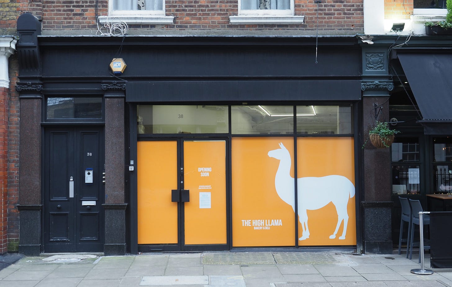 View from the street of the outside of a proposed wine bar.