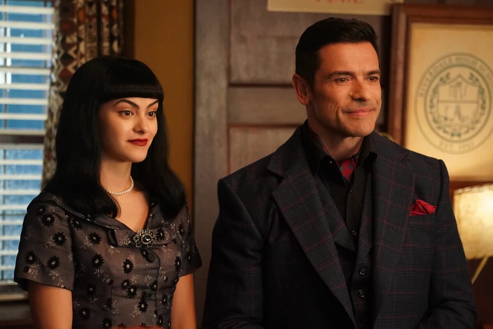 Veronica Lodge and Hiram Lodge standing at school