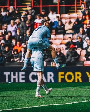 Liam Millar and Oli McBurnie celebrate against Sheffield United at Bramall Lane