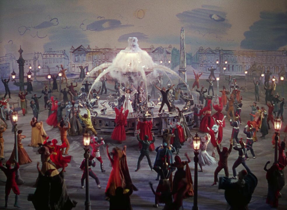 Gene Kelly standing before the fountain in the dance sequence of An American in Paris