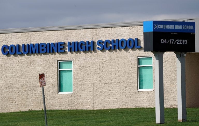 Denver suburb community debates tearing down Columbine High School | PBS  News