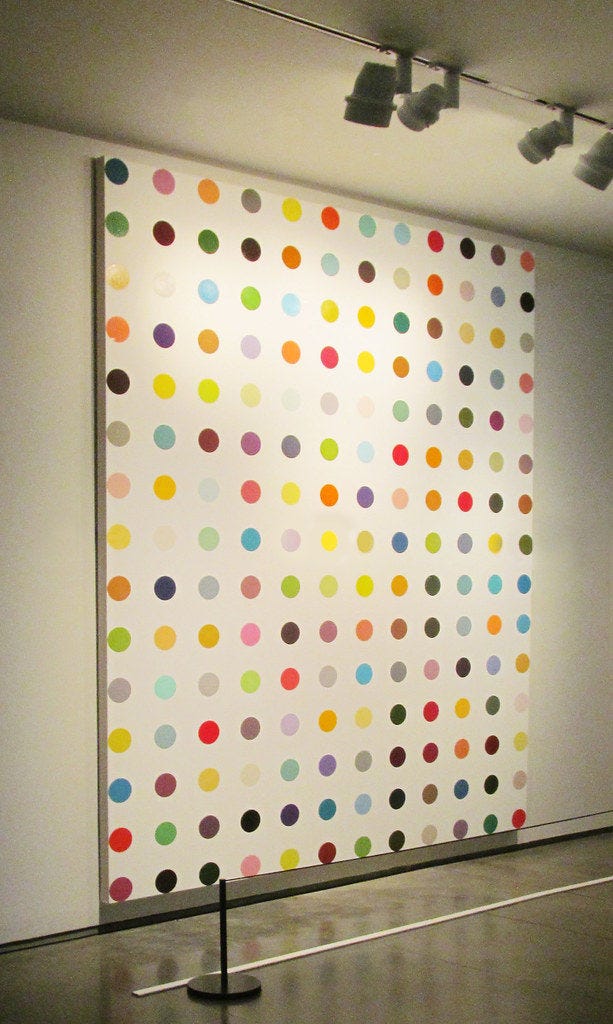 Spot Painting (1993) by Damien Hirst, a particularly egregious example of postmodern art made not by the artist but by hired-out technicians Spot Painting (1993) by Damien Hirst, a particularly egregious example of postmodern art made not by the artist but by hired-out technicians