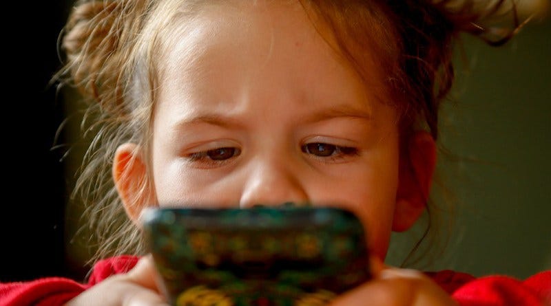 baby girl child smartphone technology videogame video game