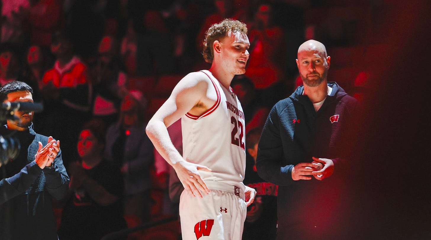 Wisconsin Badgers forward Austin Rapp standing on the court during starting lineups at the Kohl Center. Photo credit: Dane Sheehan. Wisconsin Badgers forward Austin Rapp standing on the court during starting lineups at the Kohl Center. Photo credit: Dane Sheehan.