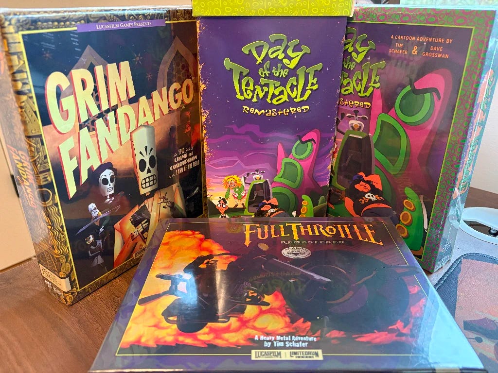 Boxes for Grim Fandango, Full Throttle, Day of the Tentacle, and the LRG triangle container.