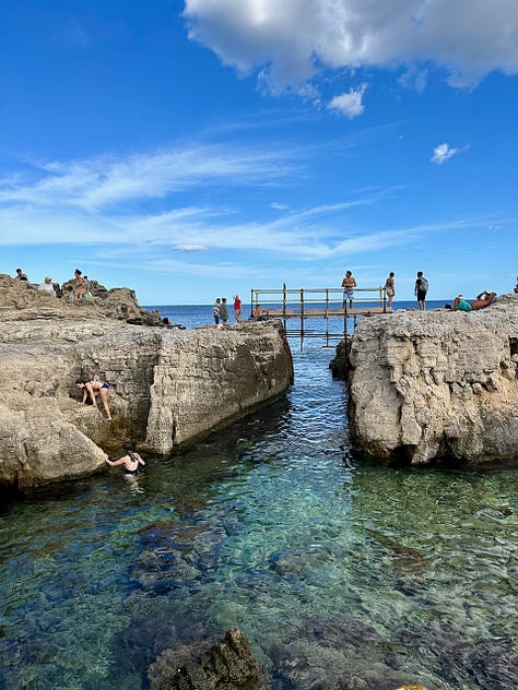  People swimming and lounging at the Solarium Forte Vigliena: Gillian Knows Best guide to Ortigia